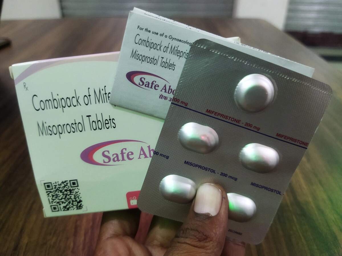 abortion tablet in front of a female doctor inside an abortion clinic in toronto